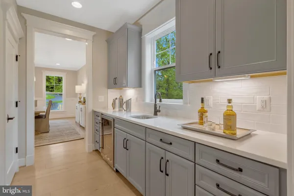 a dining room with a window and outside view