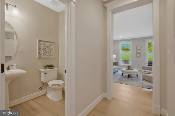 a workspace with furniture and wooden floor