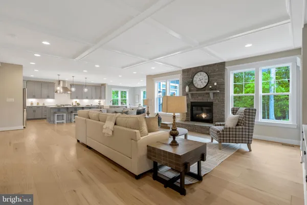 a kitchen with a sink a refrigerator and window