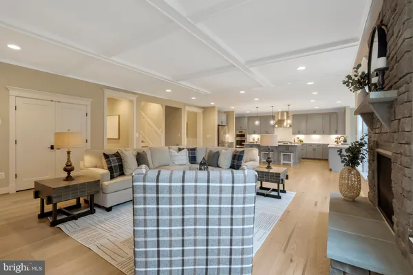 a bathroom with a sink double vanity and a large mirror