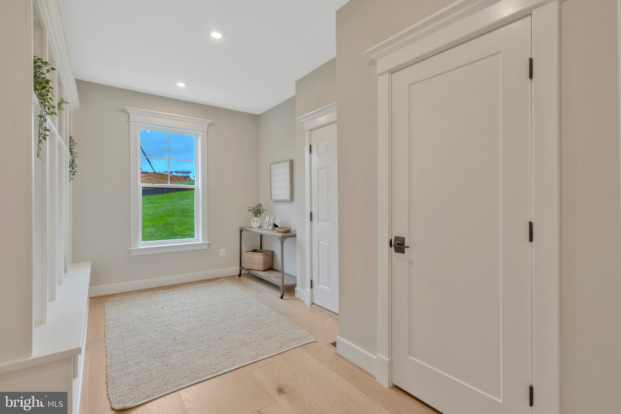 16020 Keymer Hl Court Hamilton, VA 20158 - Photo 42 of 69 a spacious bedroom with a window and a chair