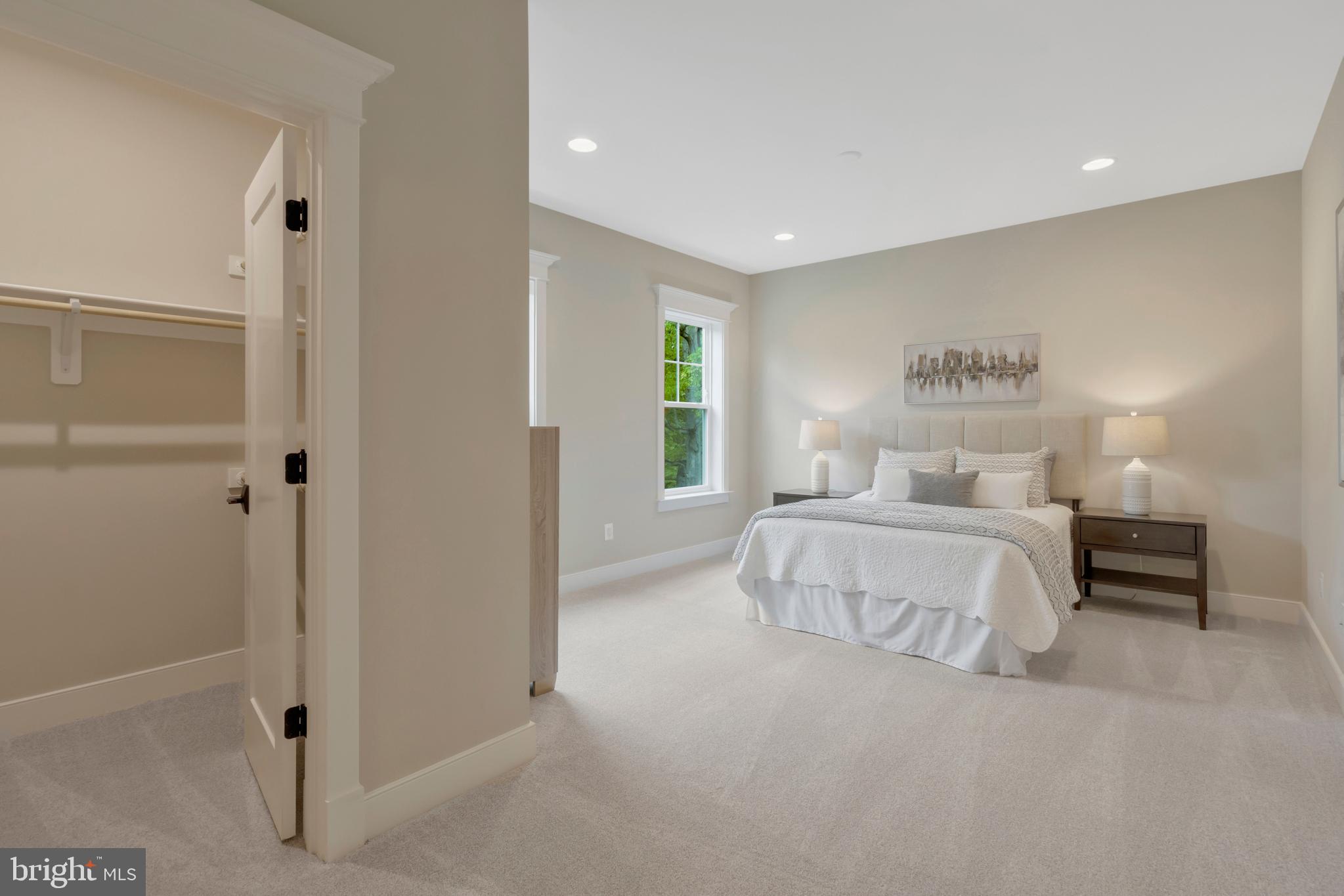 16020 Keymer Hl Court Hamilton, VA 20158 - Photo 57 of 69 a bedroom with a bed and a night stand