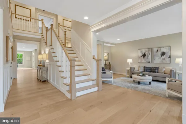 a spacious bathroom with a sink and a window