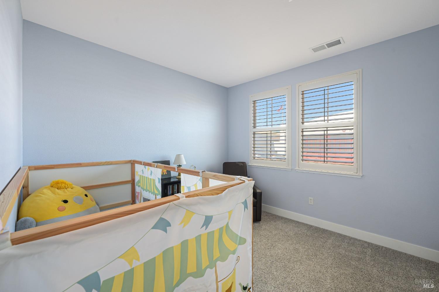 46 Audubon Way Novato, CA 94949 - Photo 21 of 31 a bedroom with a bed and a window