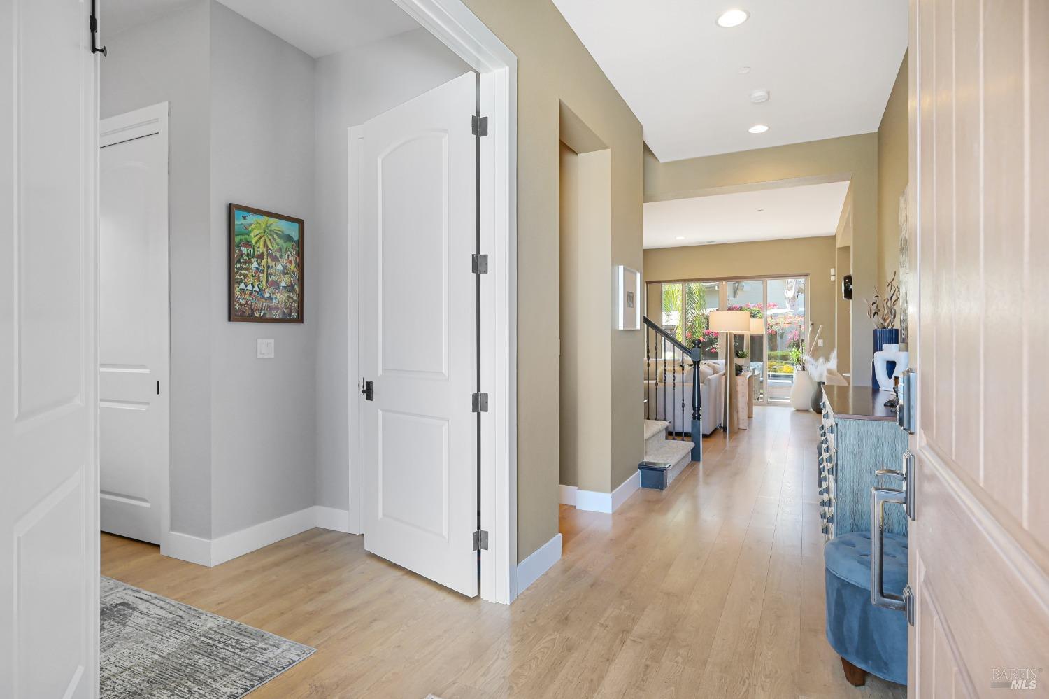 46 Audubon Way Novato, CA 94949 - Photo 5 of 31 a view of a hallway with wooden floor windows and livingroom