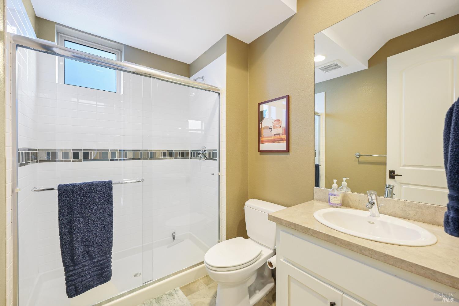 46 Audubon Way Novato, CA 94949 - Photo 8 of 31 a bathroom with a granite countertop sink and a mirror