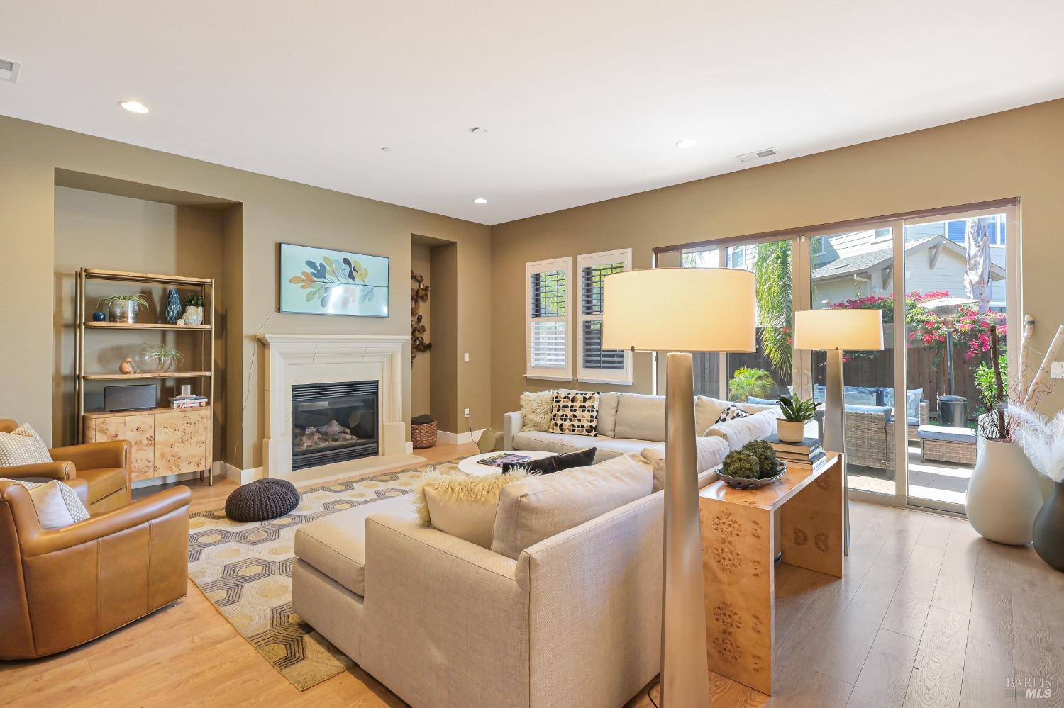 46 Audubon Way Novato, CA 94949 - Photo 9 of 31 a living room with furniture and a fireplace
