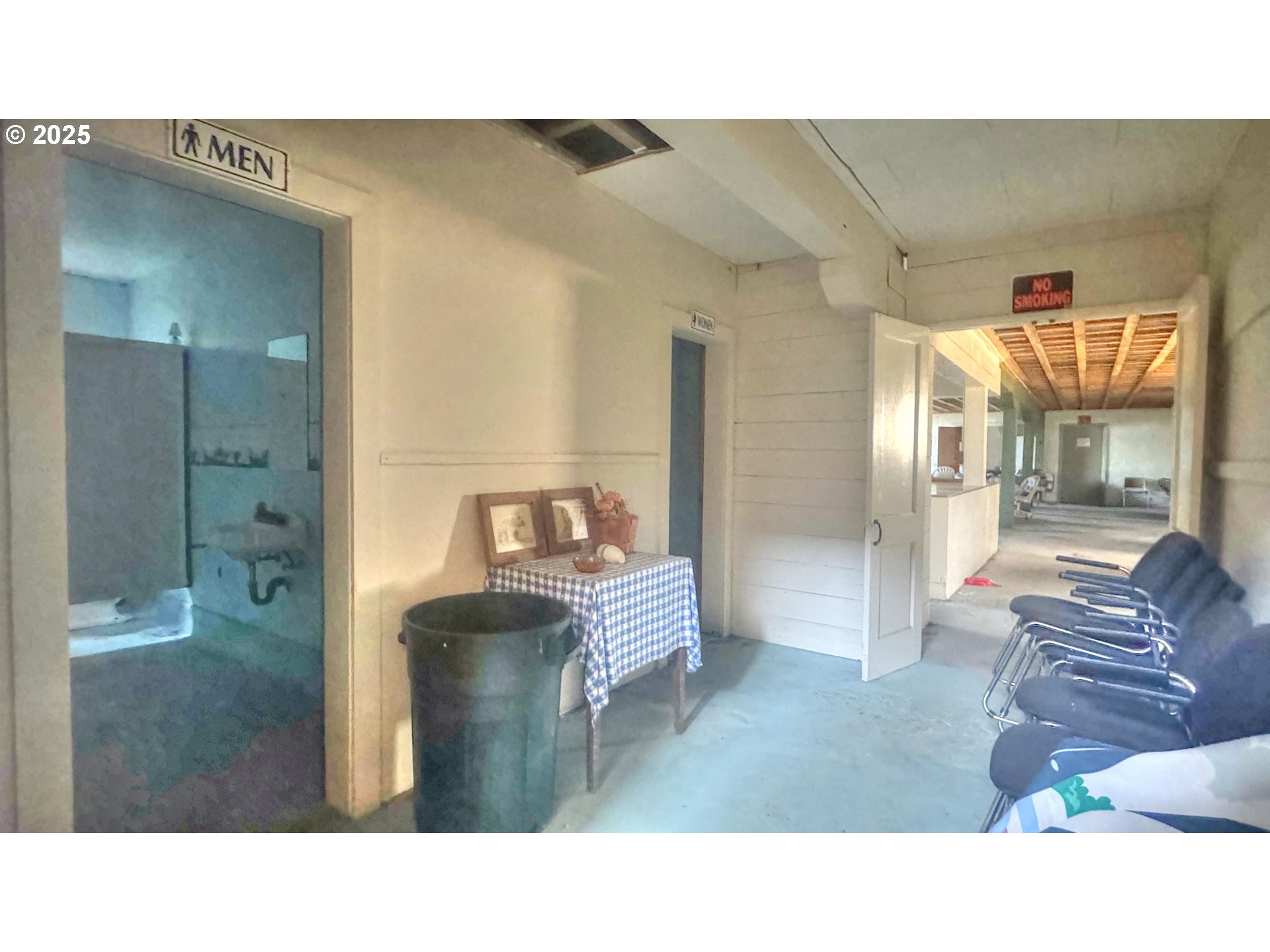 33043 Nesika Road Gold Beach, OR 97444 - Photo 11 of 23 a kitchen with a table and chair