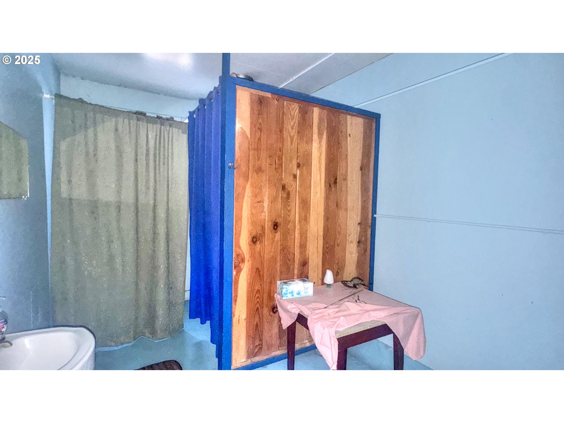 33043 Nesika Road Gold Beach, OR 97444 - Photo 14 of 23 a bathroom with a sink a toilet and mirror