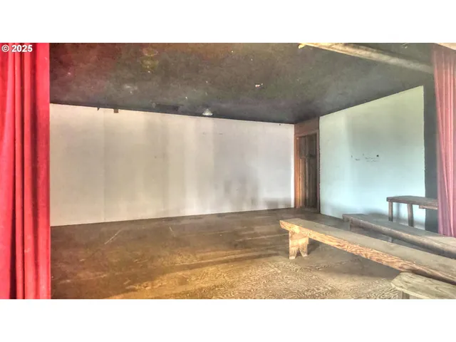 a upper view of a living room and a hall with wooden floor