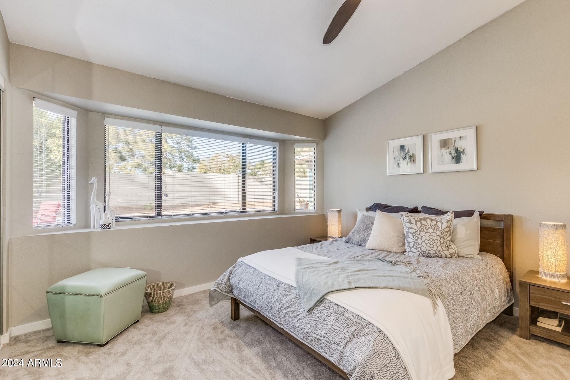 14630 North 44th Street Phoenix, AZ 85032 - Photo 15 of 32 a bedroom with a bed and a window