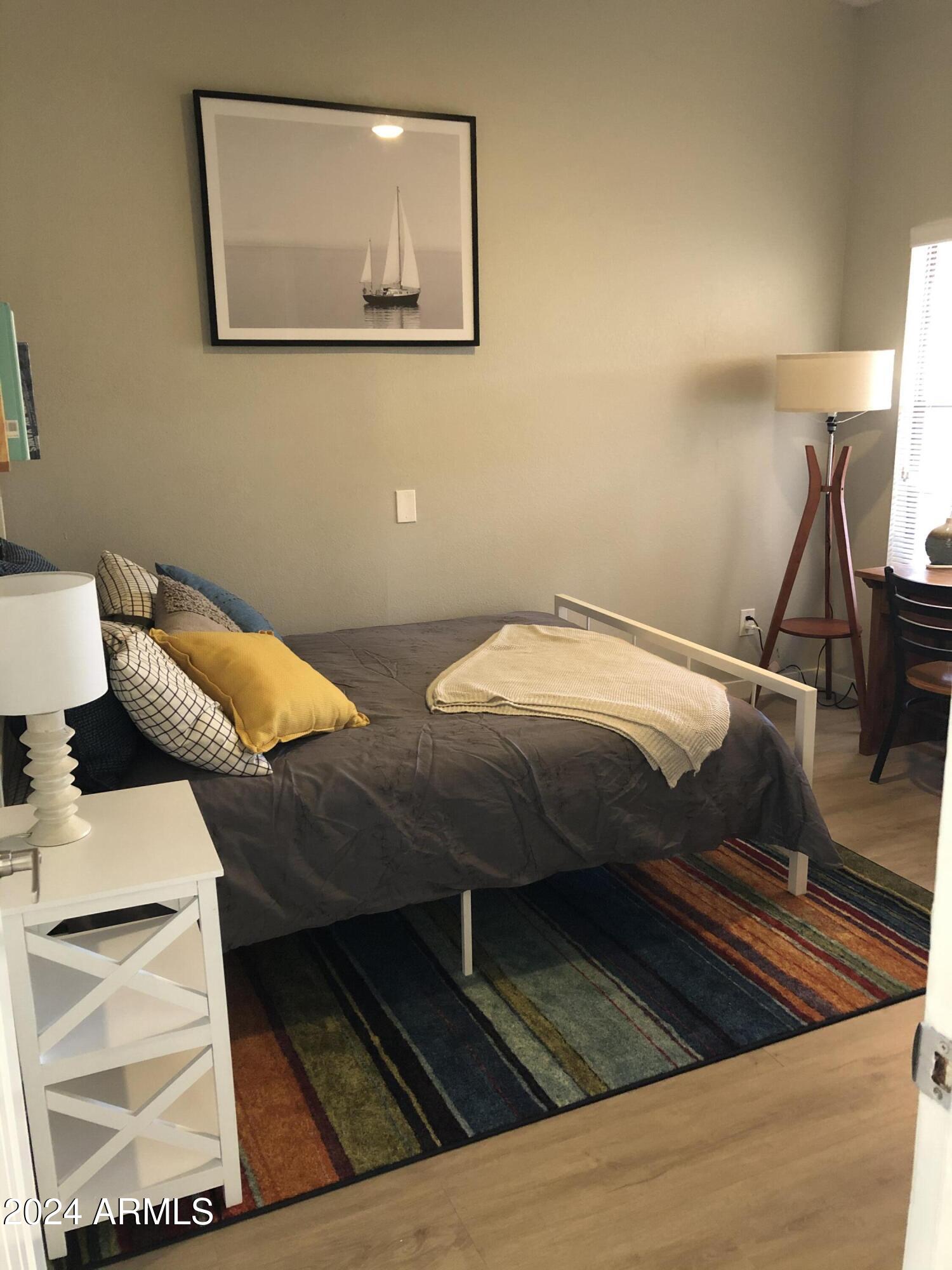 14630 North 44th Street Phoenix, AZ 85032 - Photo 22 of 32 a bedroom with two beds and a desk