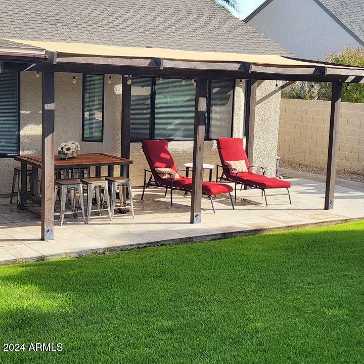 14630 North 44th Street Phoenix, AZ 85032 - Photo 25 of 32 an outdoor view of building with yard