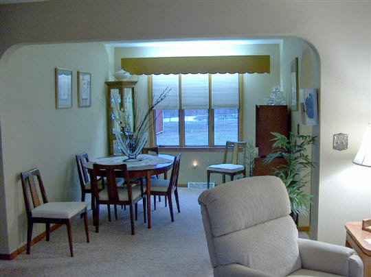 6858 Rydberg Road Rockford, IL 61109 - Photo 4 of 6 a view of a dining room with furniture window and outside view