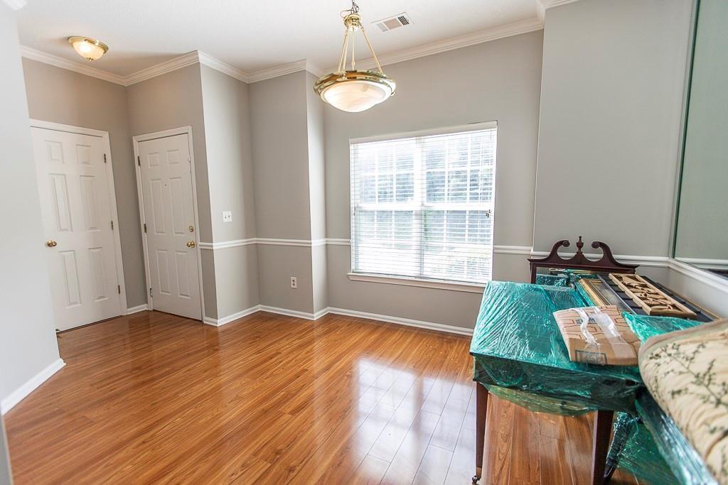 1731 Pryor Road Southwest, Unit 109 Atlanta, GA 30315 - Photo 2 of 34 a view of a livingroom with furniture and window