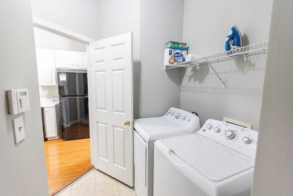 1731 Pryor Road Southwest, Unit 109 Atlanta, GA 30315 - Photo 31 of 34 a utility room with dryer and washer