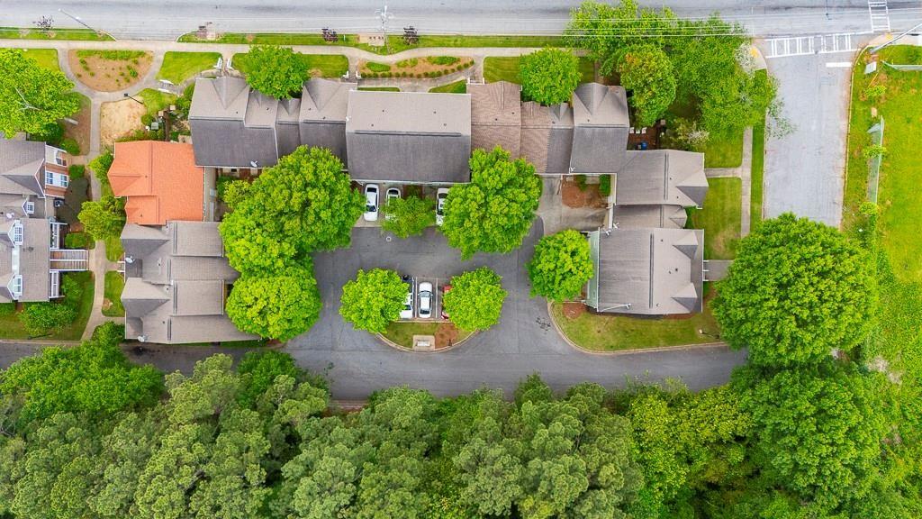 1731 Pryor Road Southwest, Unit 109 Atlanta, GA 30315 - Photo 32 of 34 an aerial view of a house with swimming pool and garden