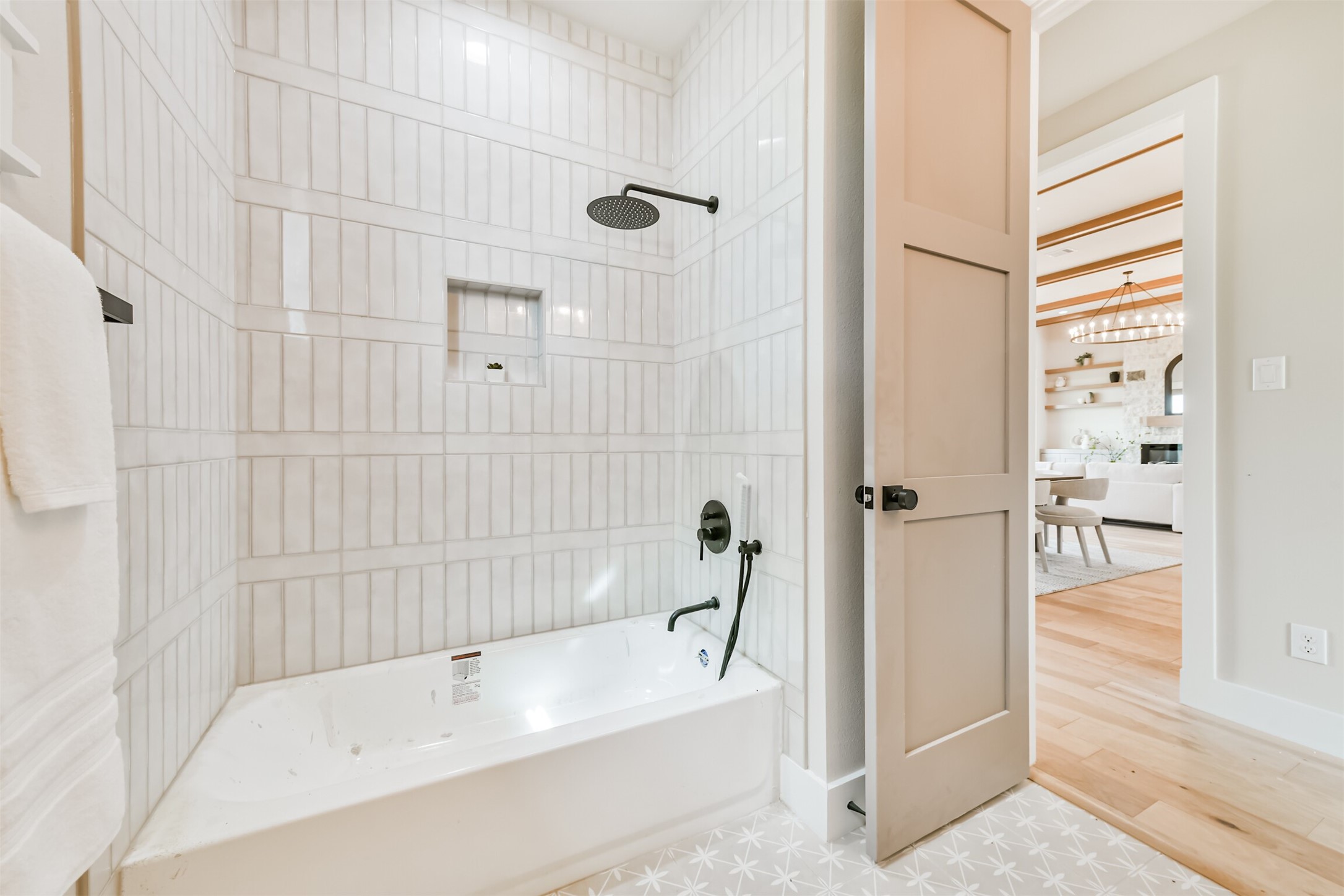 250 Pony Trail Angleton, TX 77515 - Photo 20 of 32 Stylish full bathroom with elegant tilework and modern fixtures, offering comfort and convenience for family and guests.