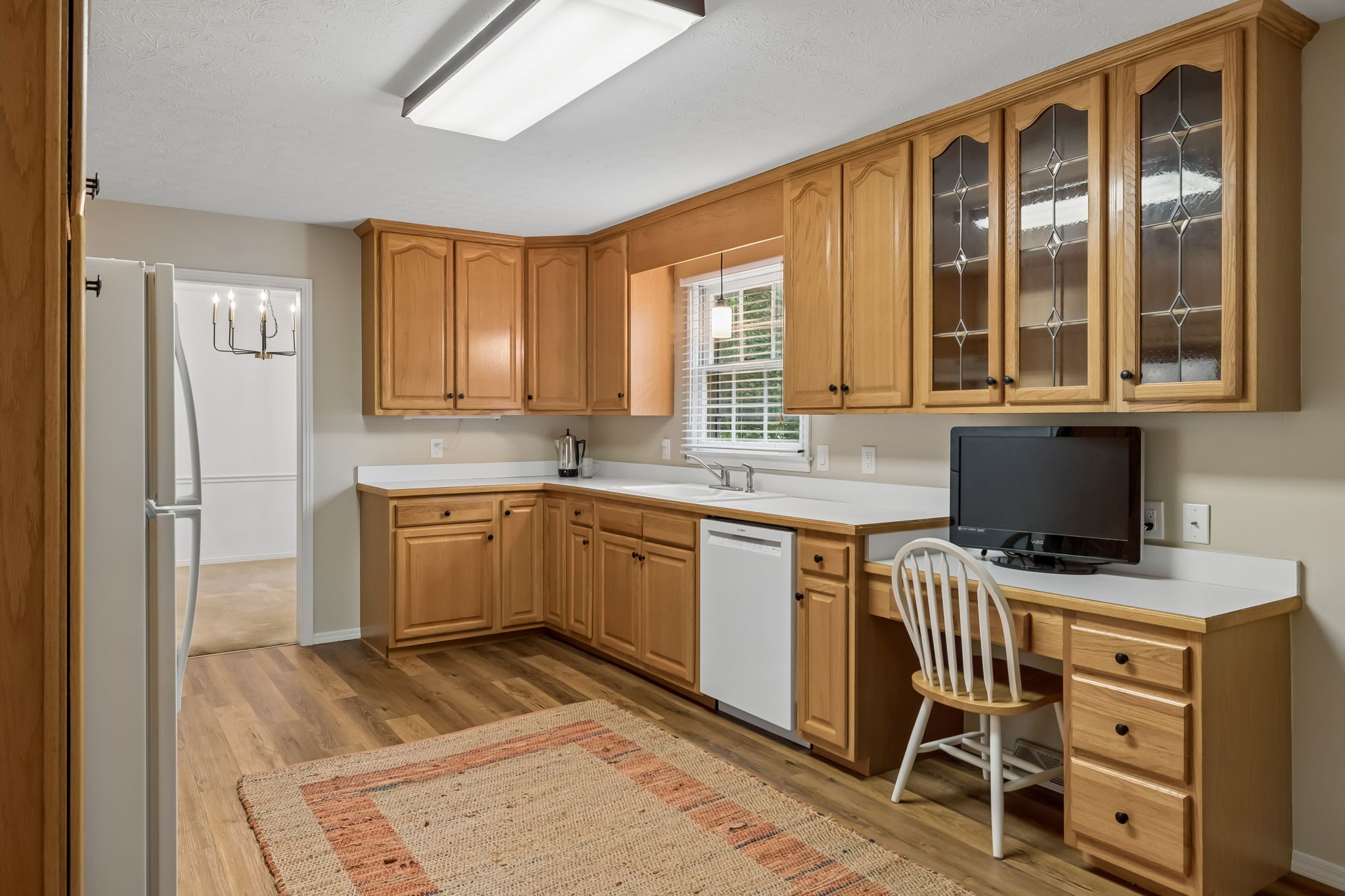 1343 Whiteaker Springs Road Cookeville, TN 38506 - Photo 20 of 48 a kitchen with stainless steel appliances kitchen island granite countertop a stove a sink and a microwave