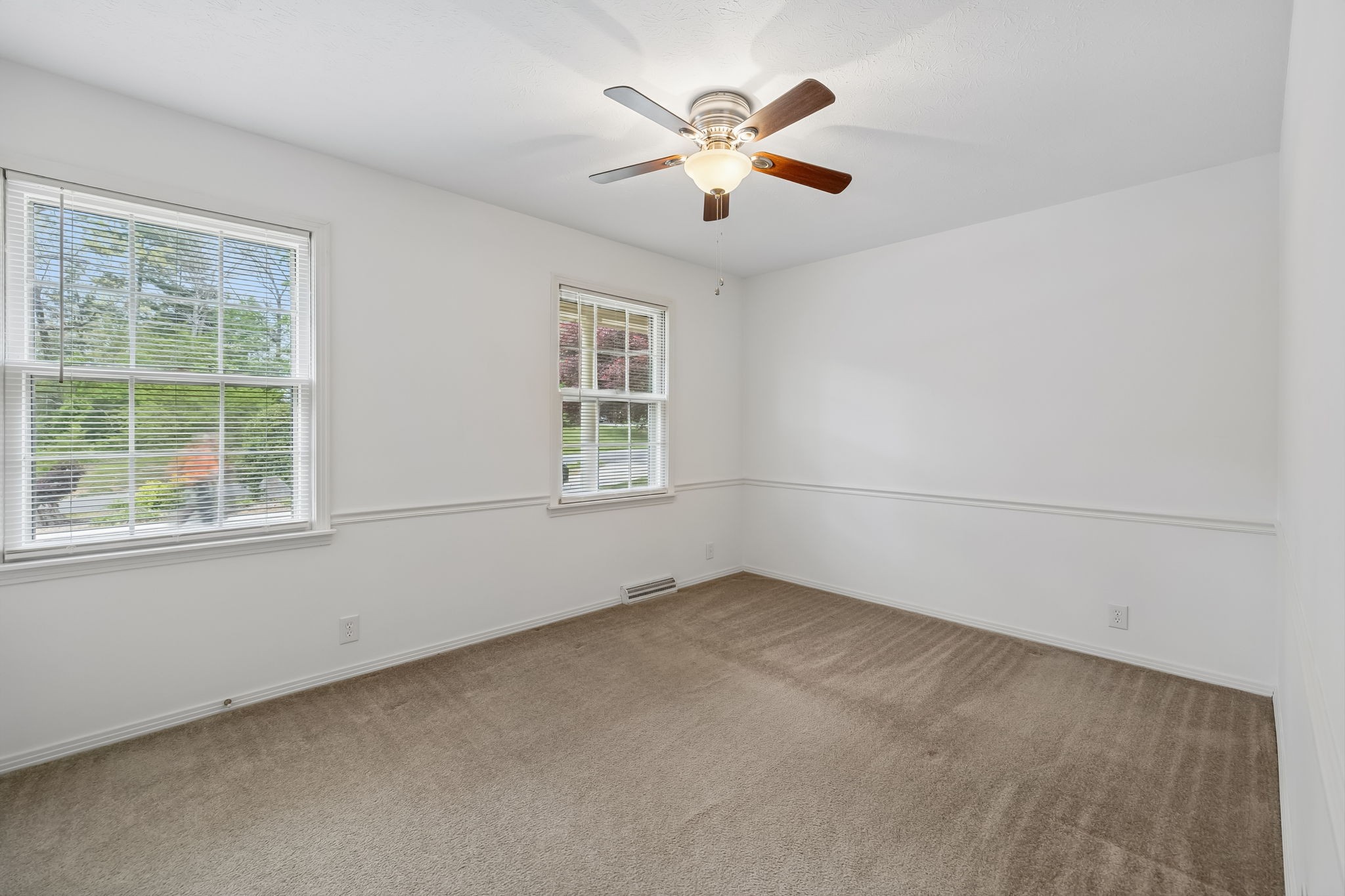 1343 Whiteaker Springs Road Cookeville, TN 38506 - Photo 21 of 48 an empty room with a window