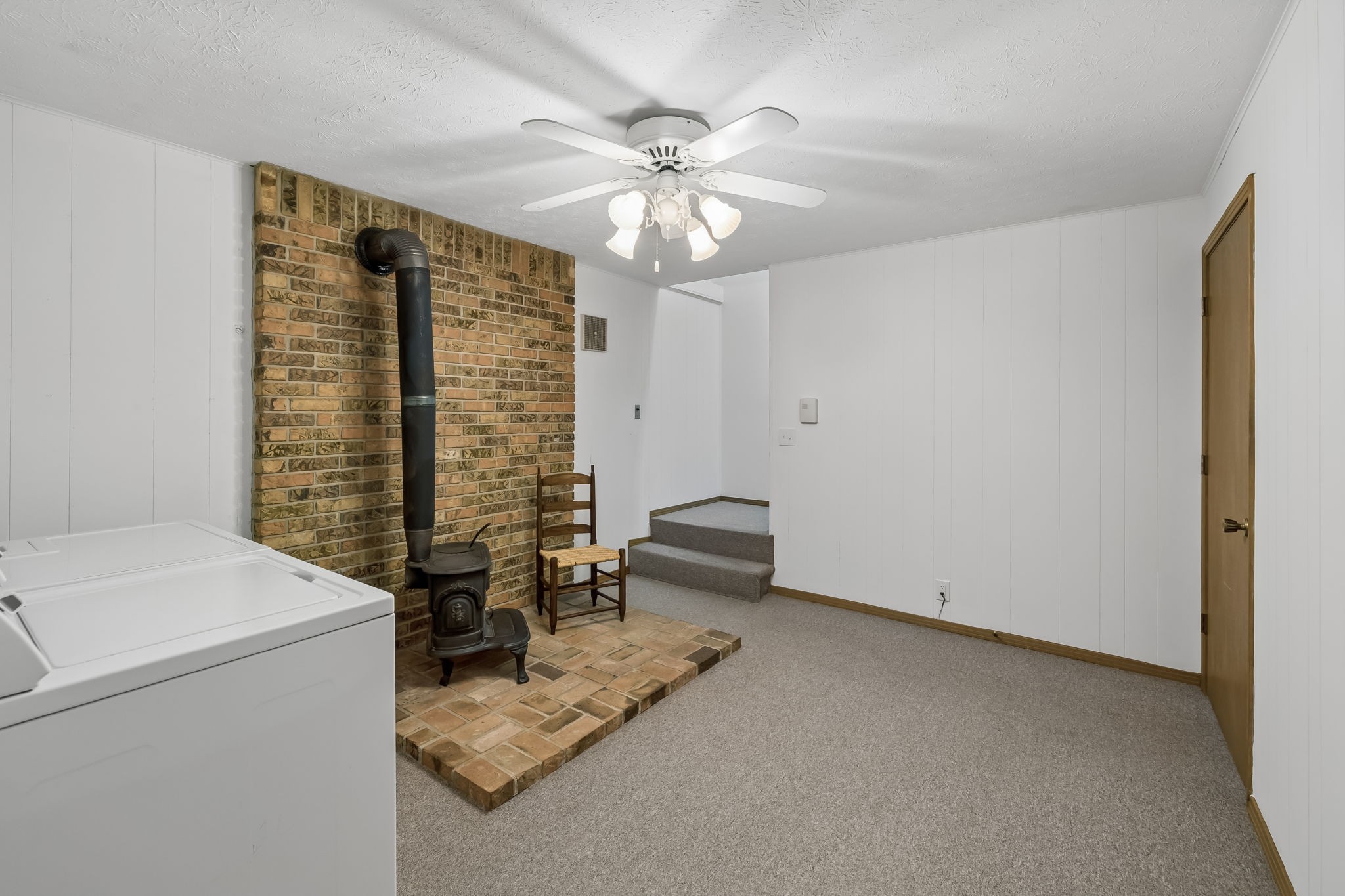 1343 Whiteaker Springs Road Cookeville, TN 38506 - Photo 30 of 48 a workspace with furniture and chandelier