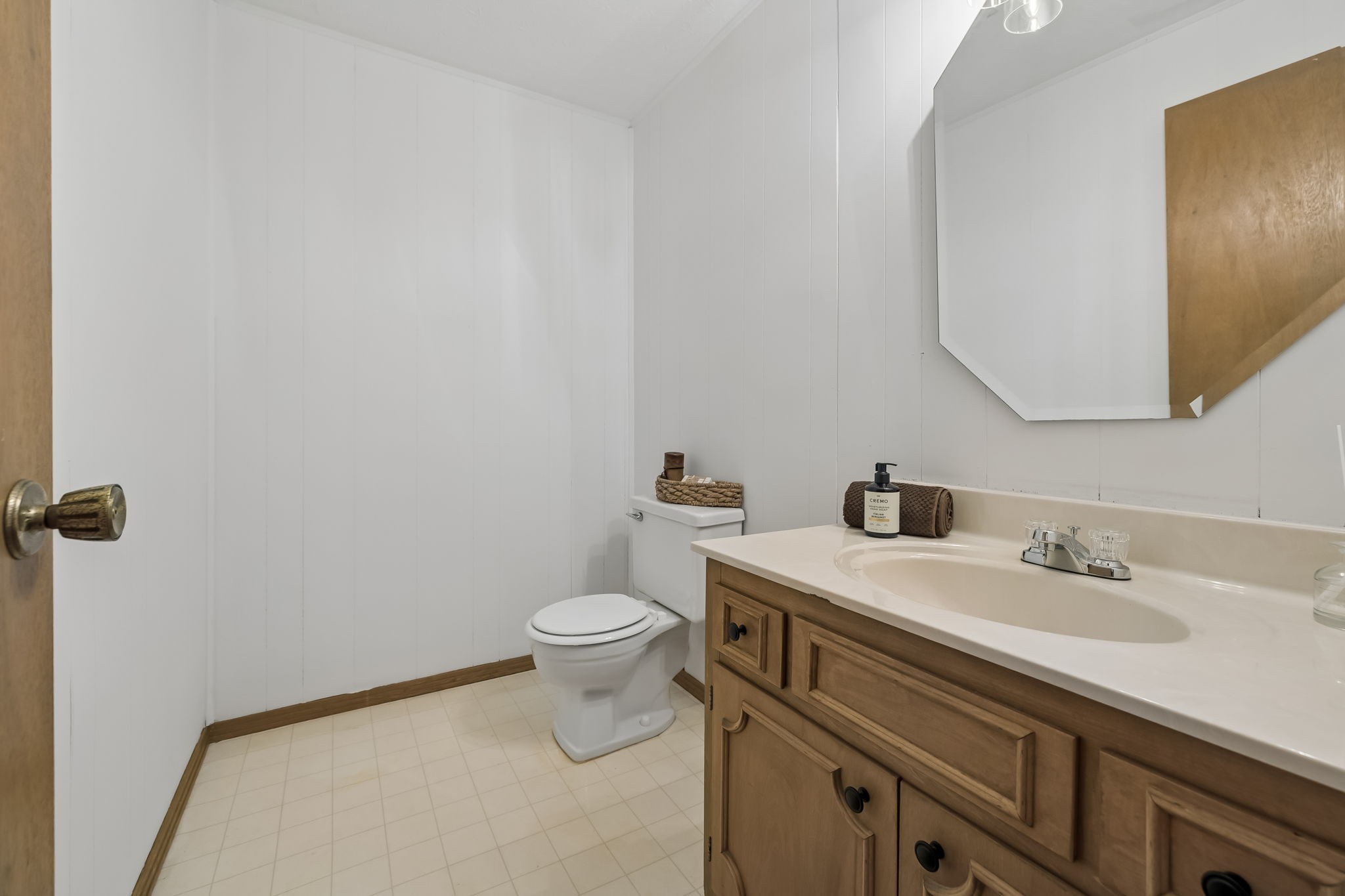 1343 Whiteaker Springs Road Cookeville, TN 38506 - Photo 34 of 48 a bathroom with a sink toilet and mirror