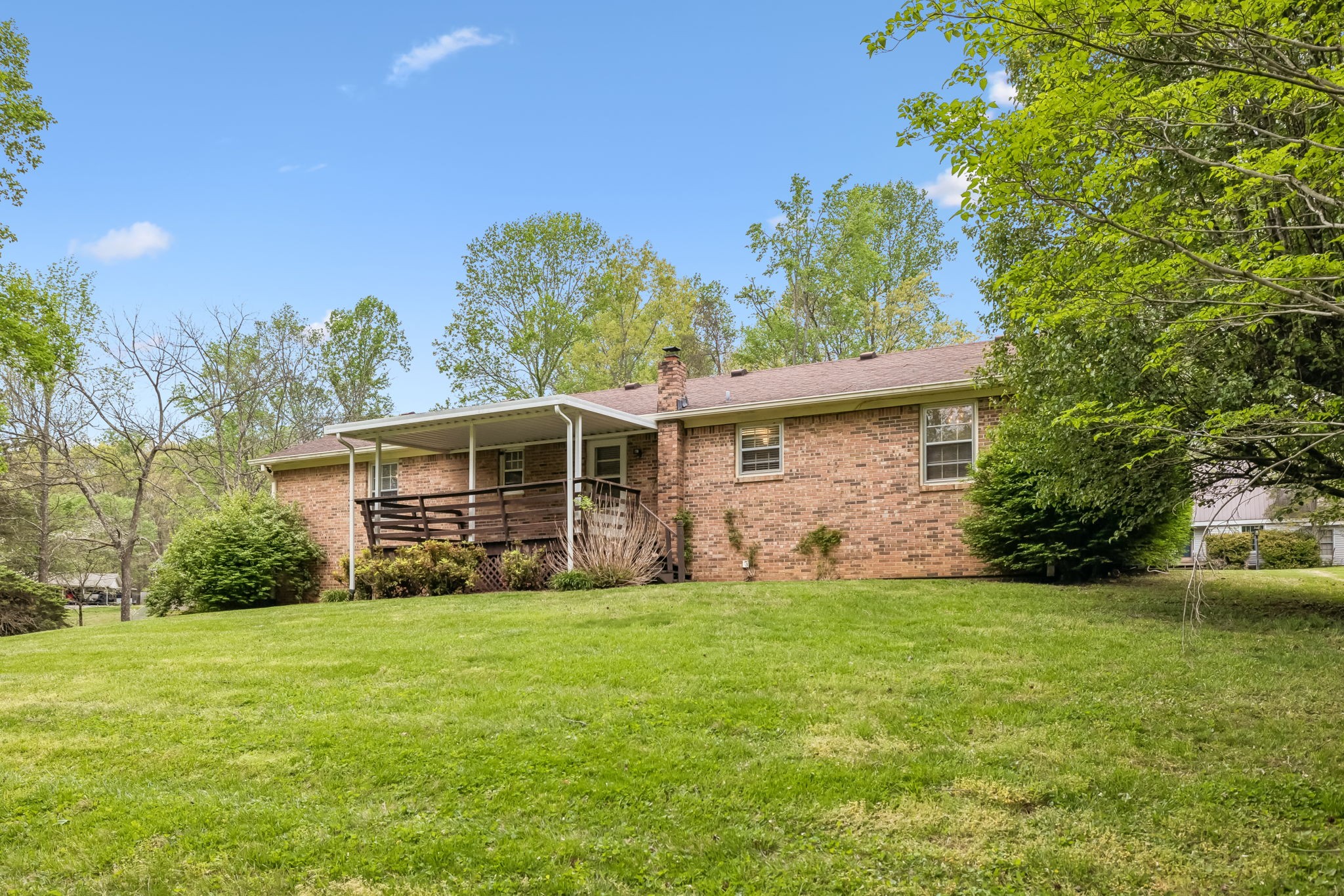 1343 Whiteaker Springs Road Cookeville, TN 38506 - Photo 44 of 48 a view of a house with a yard