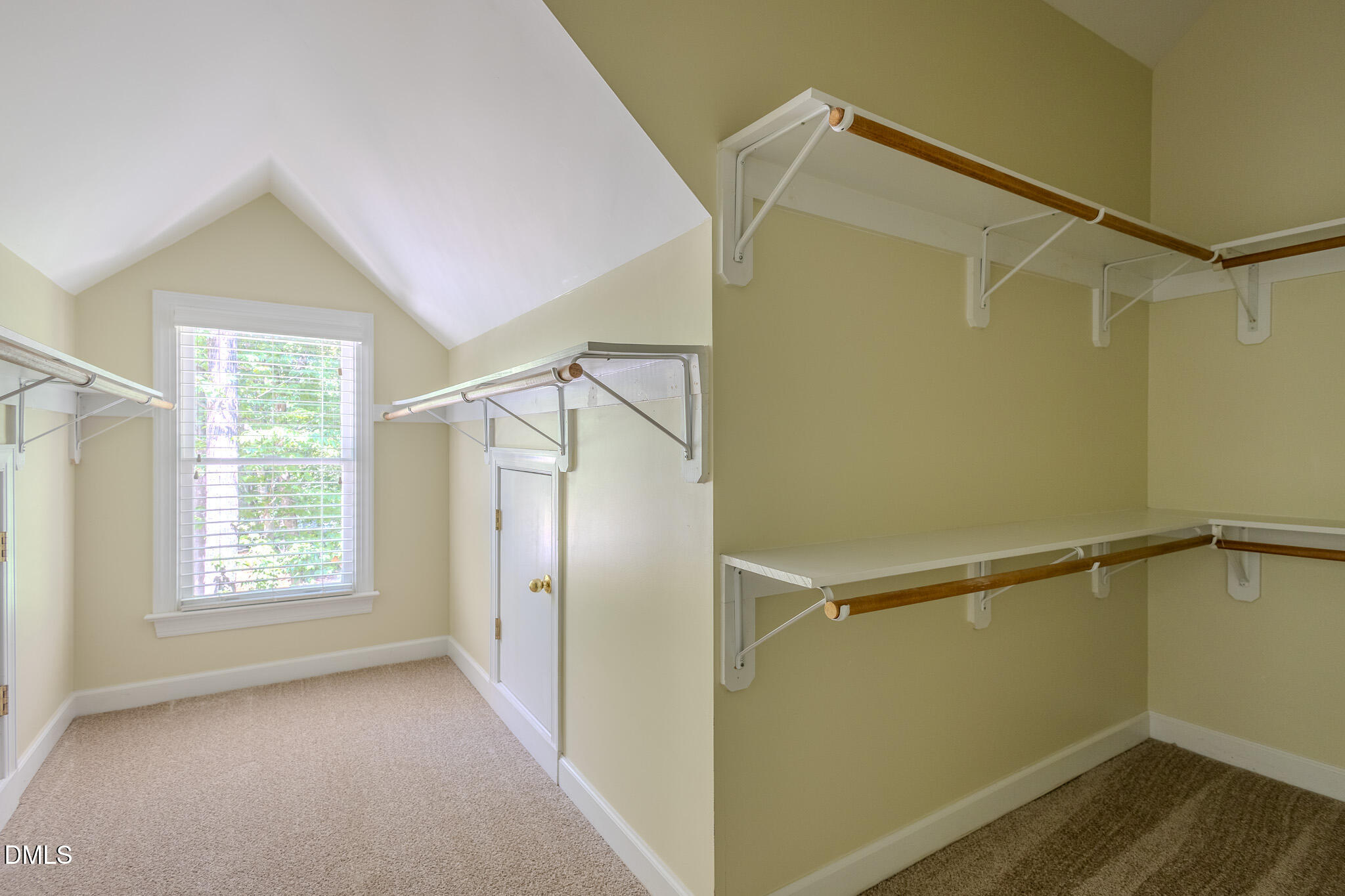 2729 Sunnystone Way Raleigh, NC 27613 - Photo 18 of 37 a view of an empty room with a window