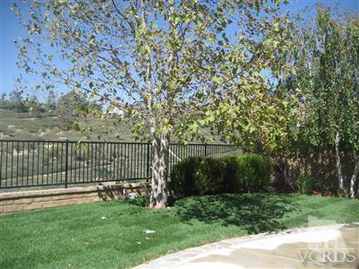 5813 Indian Pointe Drive Simi Valley, CA 93063 - Photo 22 of 25 a view of a backyard with a garden