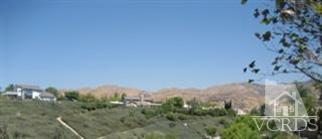 5813 Indian Pointe Drive Simi Valley, CA 93063 - Photo 5 of 25 a view of a city with lush green forest