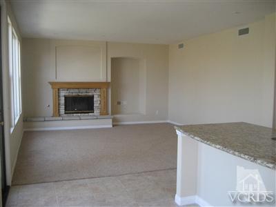 5813 Indian Pointe Drive Simi Valley, CA 93063 - Photo 10 of 25 a stove top oven sitting inside of a kitchen
