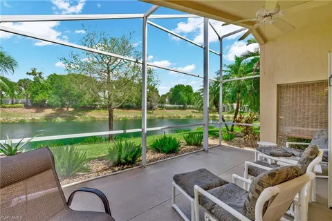 a patio with table and chairs