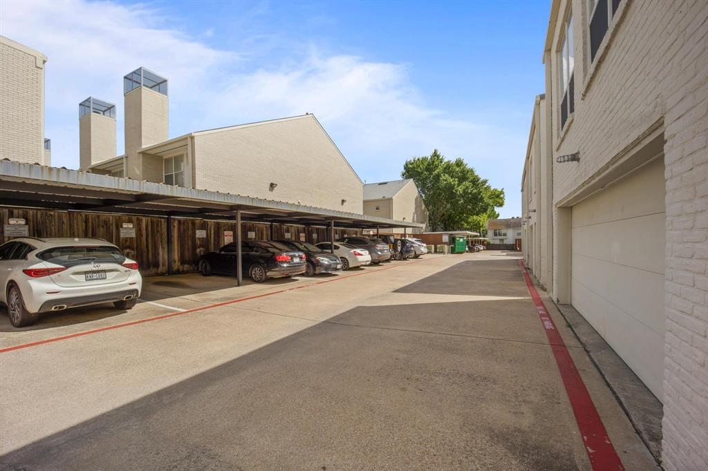 4134 Travis Street, Unit 11 Dallas, TX 75204 - Photo 25 of 29 a view of street with parked cars
