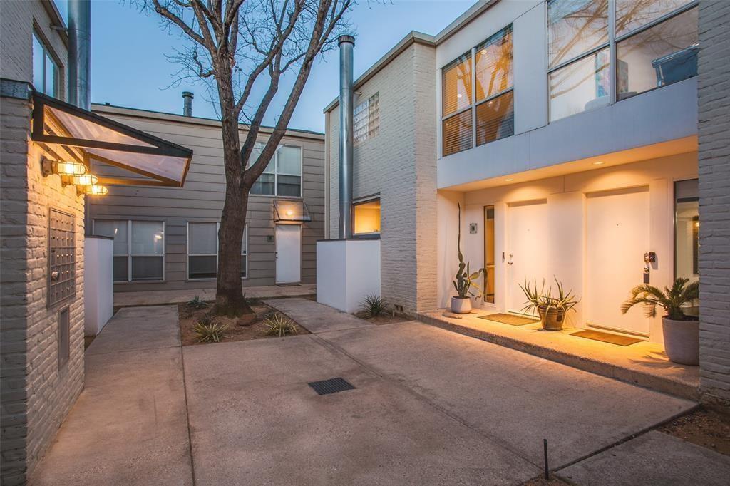 4134 Travis Street, Unit 11 Dallas, TX 75204 - Photo 4 of 29 a view of a building with a outdoor space
