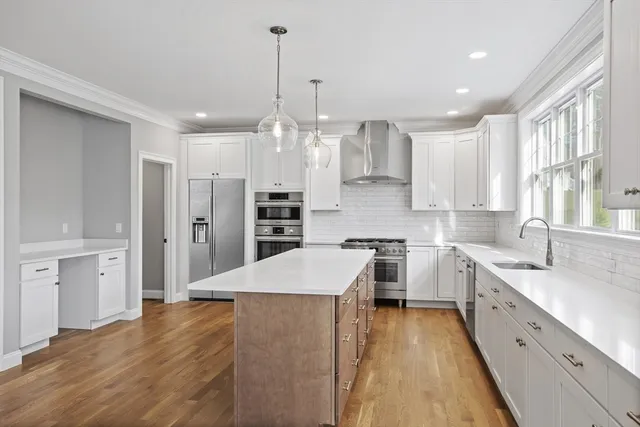a bathroom with a bathtub and a sink