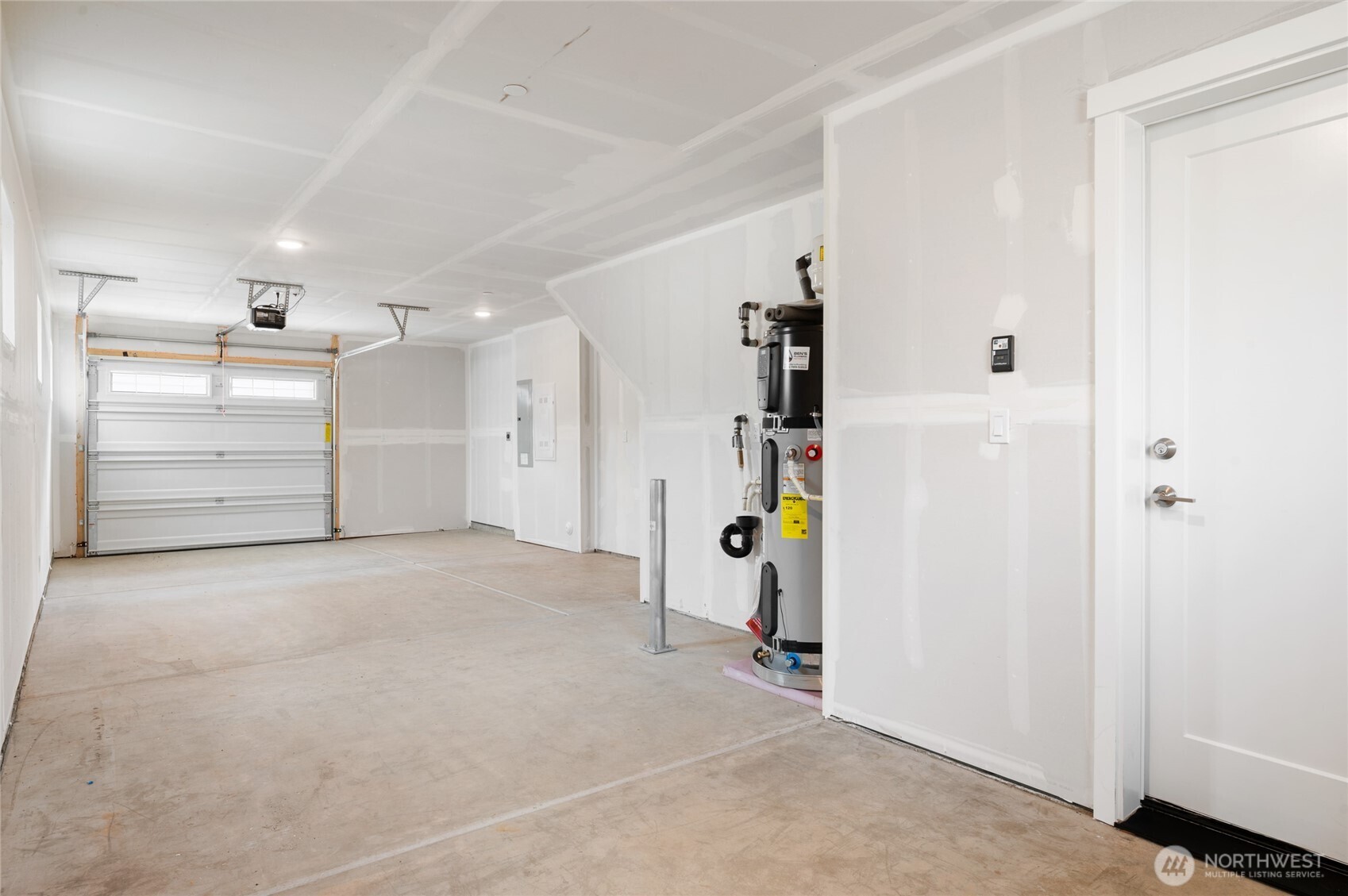 1322 194th Street Southeast, Unit B5 Bothell, WA 98012 - Photo 12 of 13 a view of a storage & utility room with closet dryer and washer