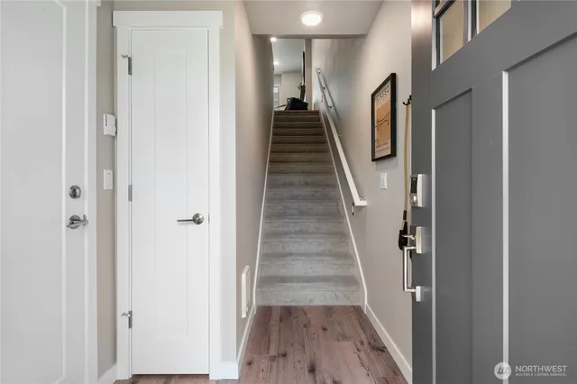 a view of entryway with wooden floor