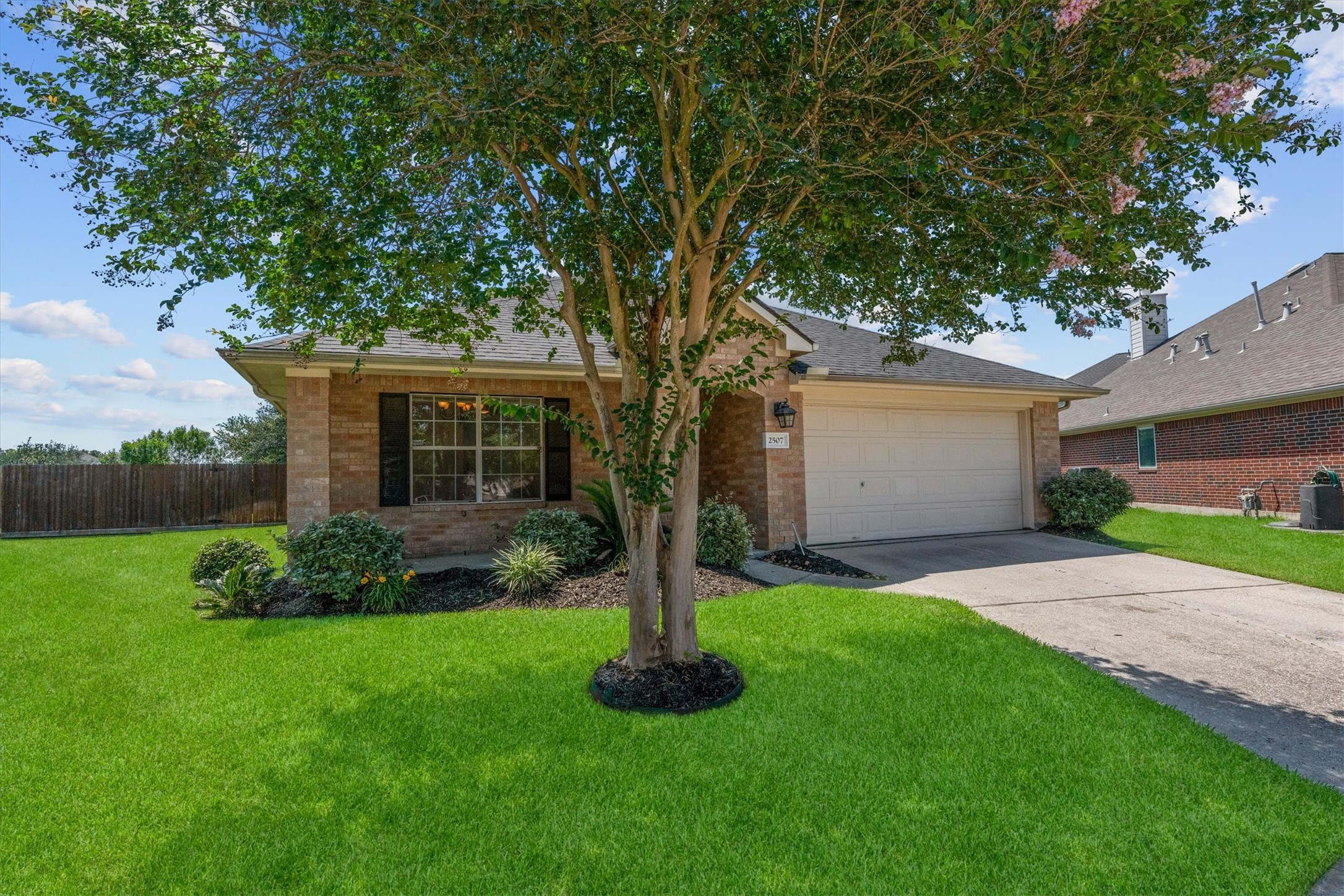 2507 Grayfeather Court Spring, TX 77388 - Photo 7 of 37 Plenty of curb appeal and greenery make this home an idyllic setting to come home to.