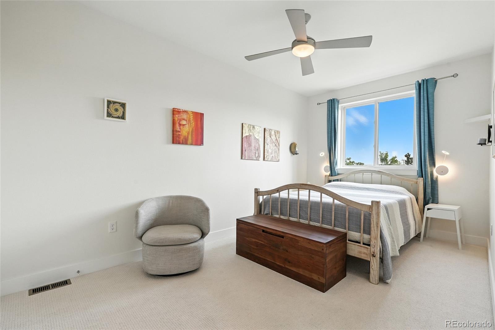 2530 28th Street, Unit 118 Boulder, CO 80301 - Photo 14 of 30 a spacious bedroom with a bed and a couch