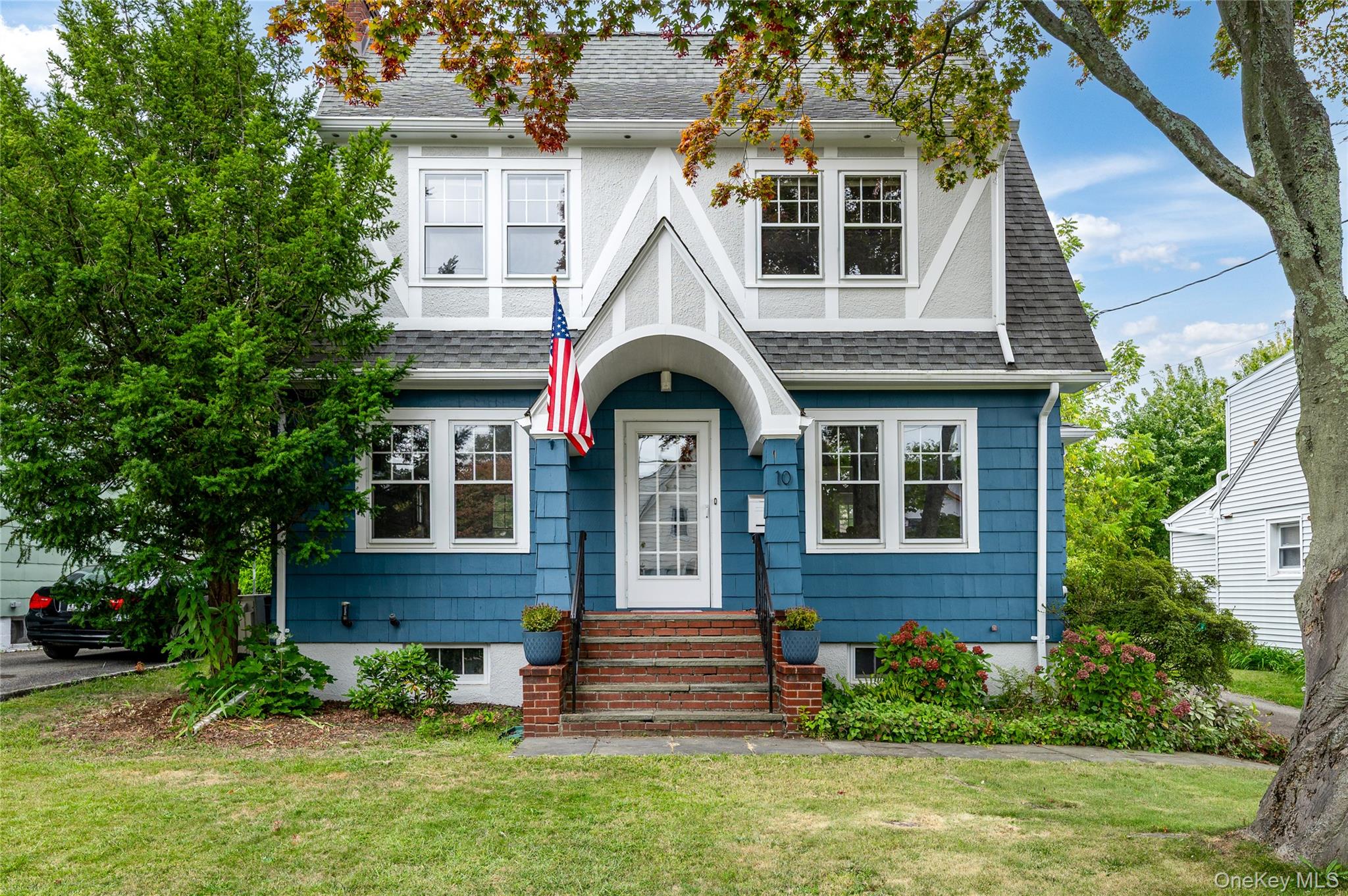 10 Mohegan Road Ossining, NY 10562 - Photo 1 of 1 a front view of a house with a yard