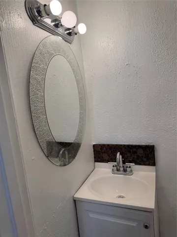 a bathroom with a sink and a toilet