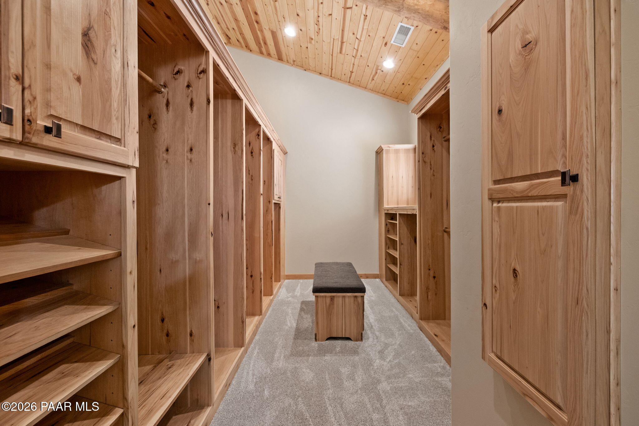 5140 East Charcoal Kiln Road Prescott, AZ 86303 - Photo 53 of 140 a view of a hallway with wooden cabinets and staircase