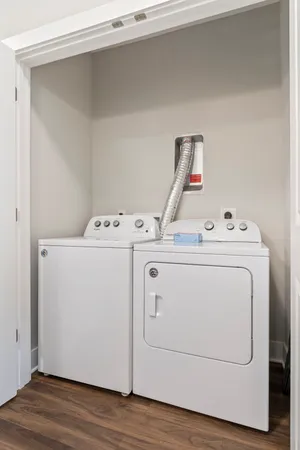 a utility room with dryer and washer