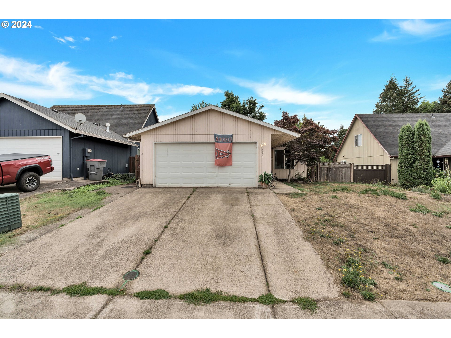 325 Cosmo Street Lafayette, OR 97127 - Photo 1 of 29 a front view of a house with a yard