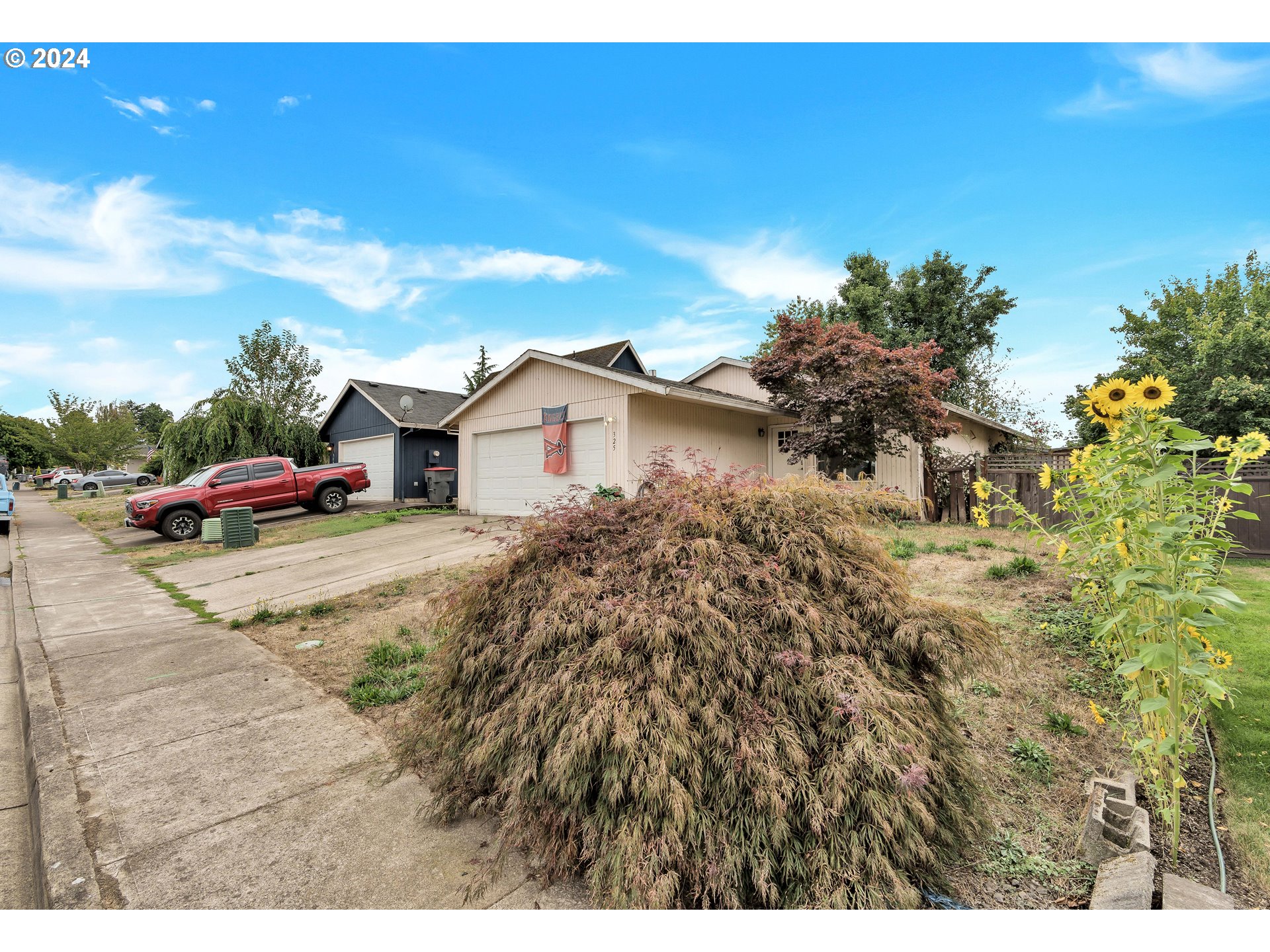 325 Cosmo Street Lafayette, OR 97127 - Photo 2 of 29 a view of multiple houses with a yard