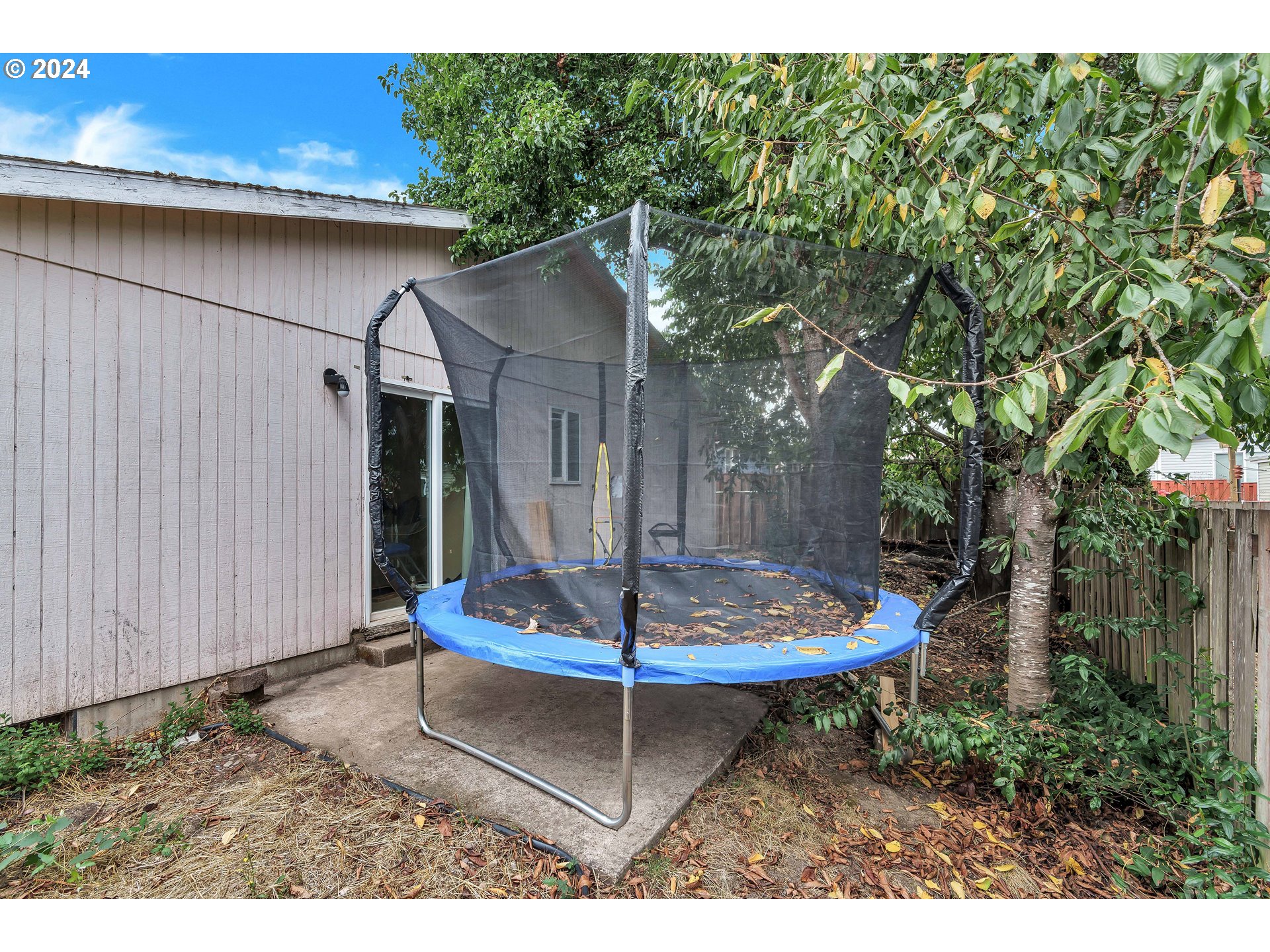 325 Cosmo Street Lafayette, OR 97127 - Photo 24 of 29 a backyard of a house with fountain table and chairs
