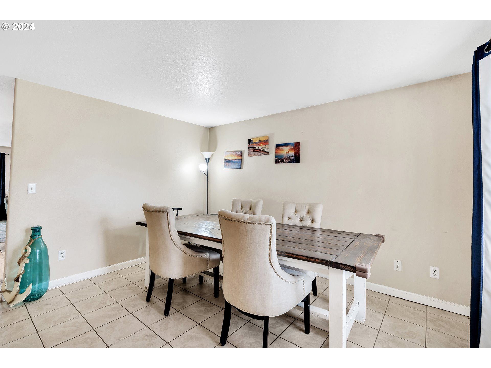 325 Cosmo Street Lafayette, OR 97127 - Photo 6 of 29 a view of a dining room with furniture and wooden floor
