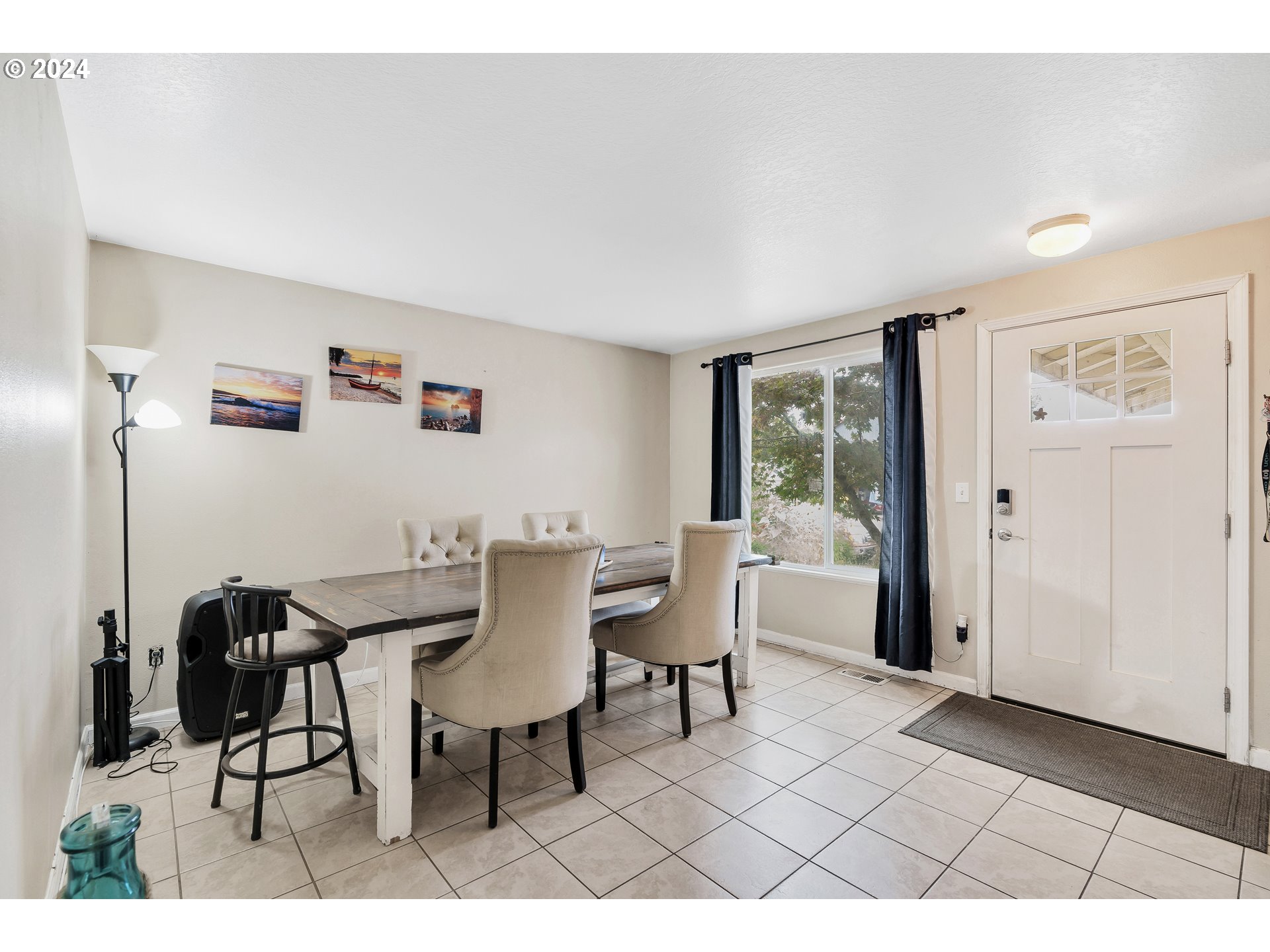 325 Cosmo Street Lafayette, OR 97127 - Photo 7 of 29 a view of a dining room with furniture and a window