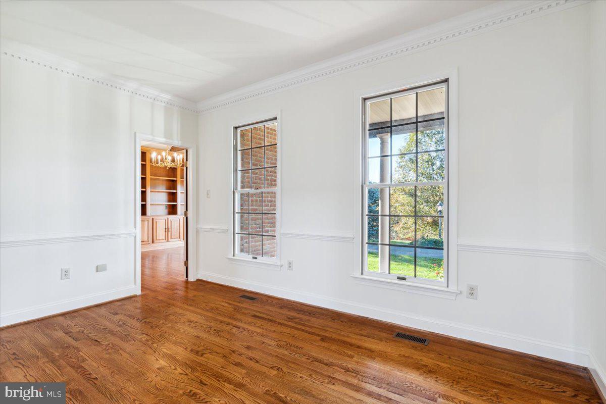 7130 Ira Sears Road Adamstown, MD 21710 - Photo 6 of 70 Double crown molding and front porch views.