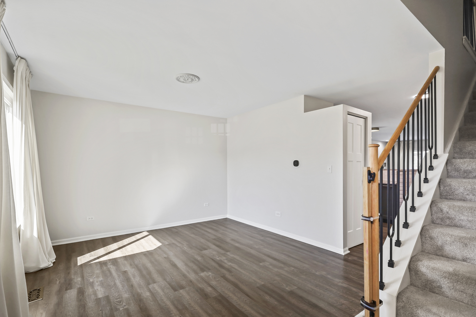 2420 Roxbury Lane Montgomery, IL 60538 - Photo 4 of 25 a view of hallway with wooden floor